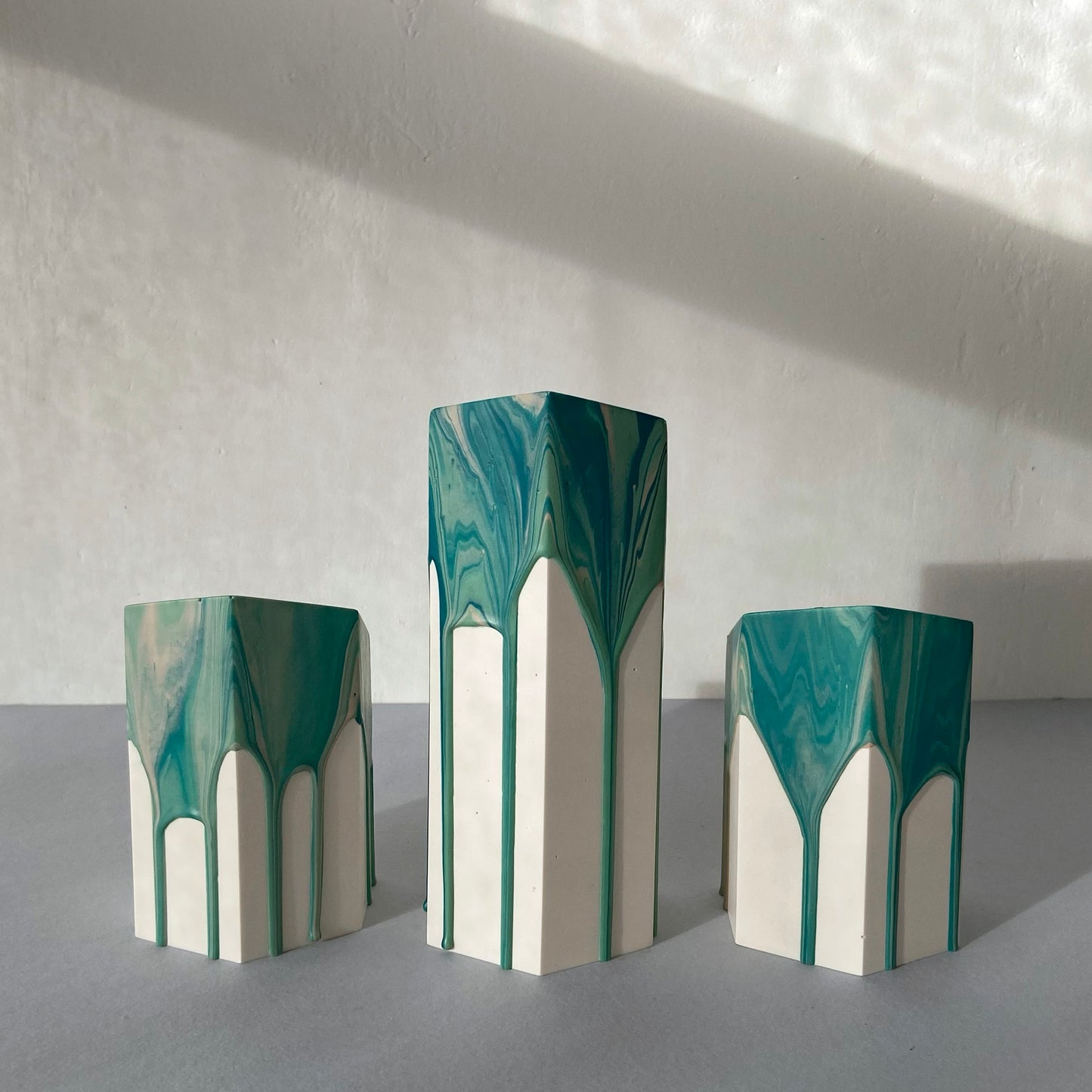 Drippy candle holders in teal + pink