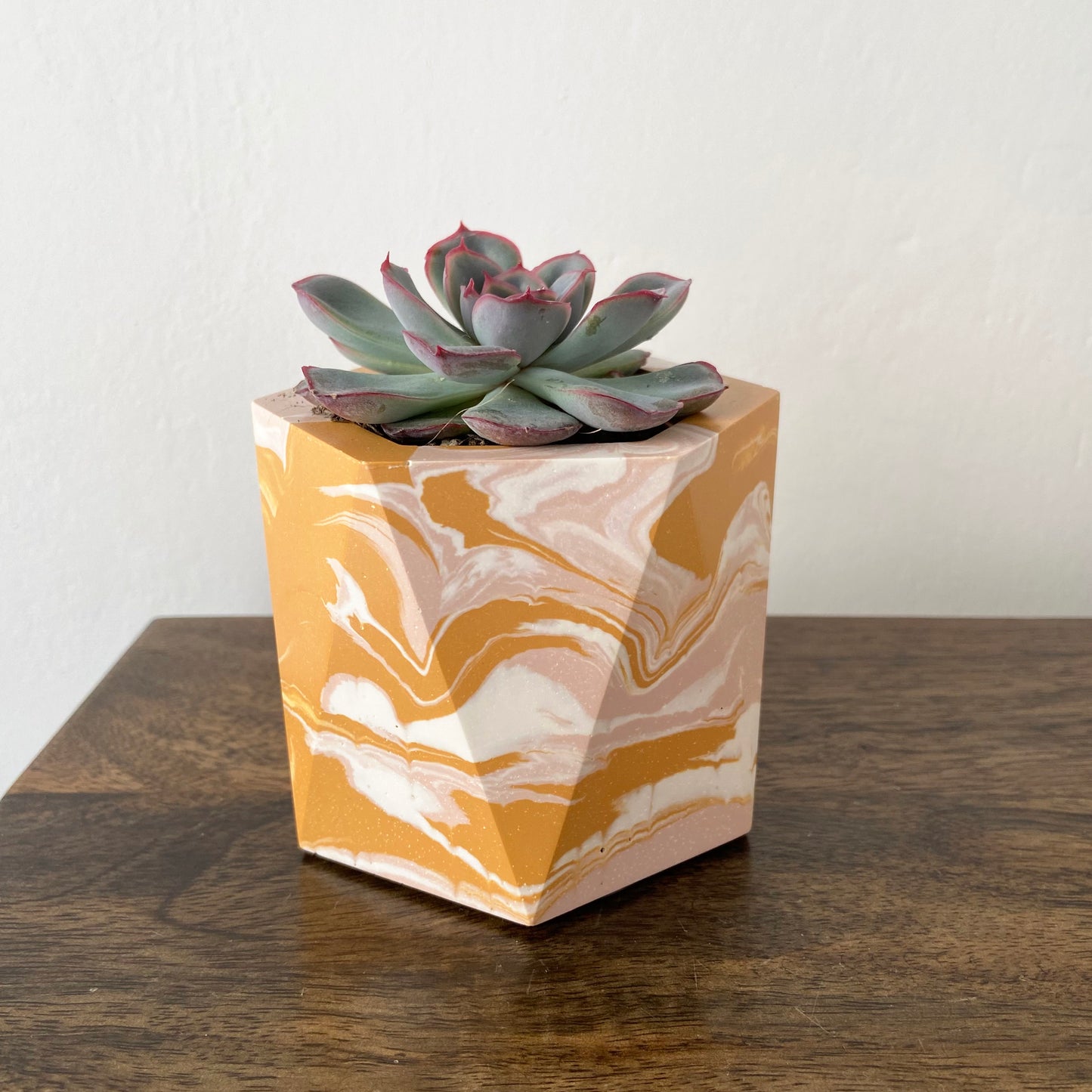 Small geometric marbled plant pot in mustard + pink
