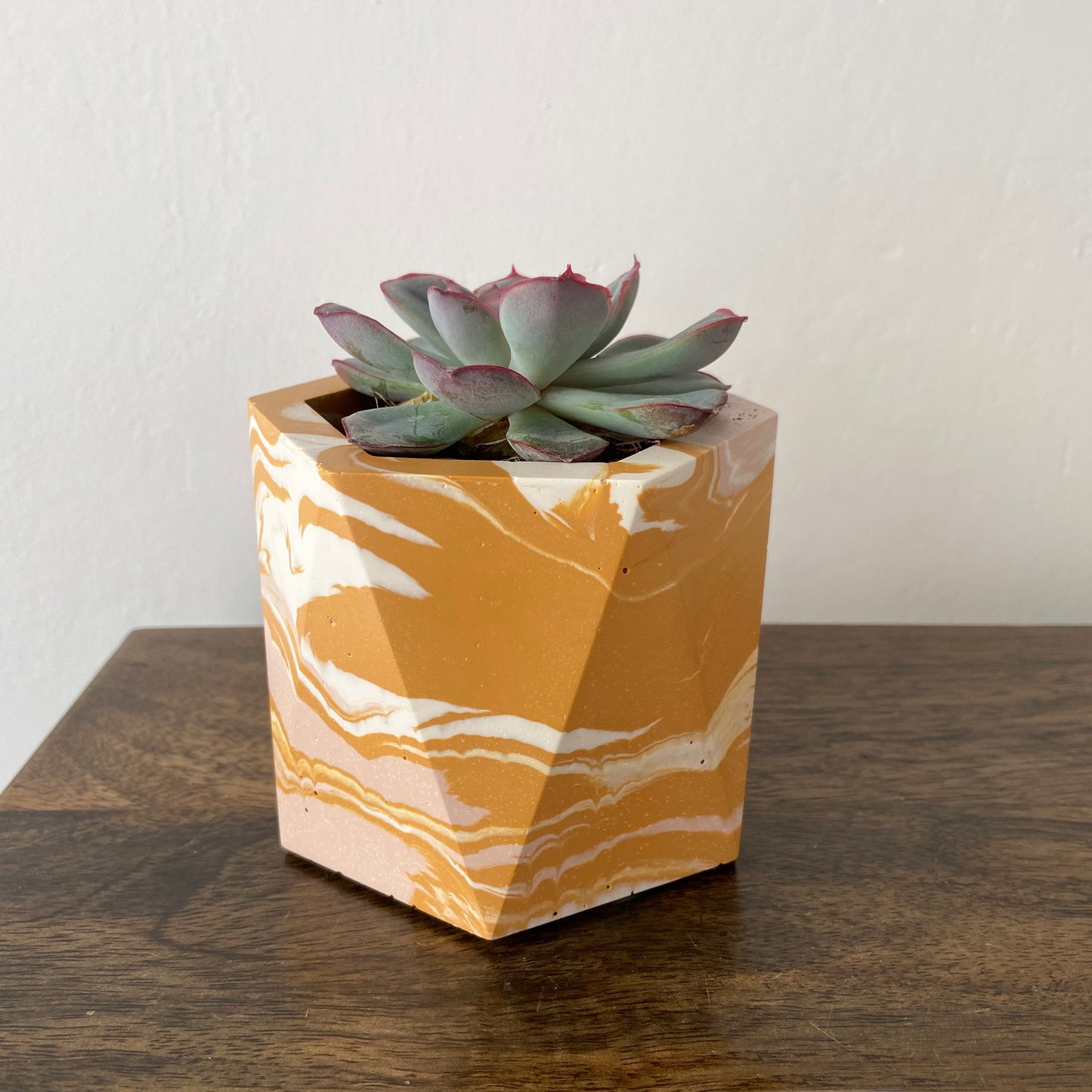 Small geometric marbled plant pot in mustard + pink