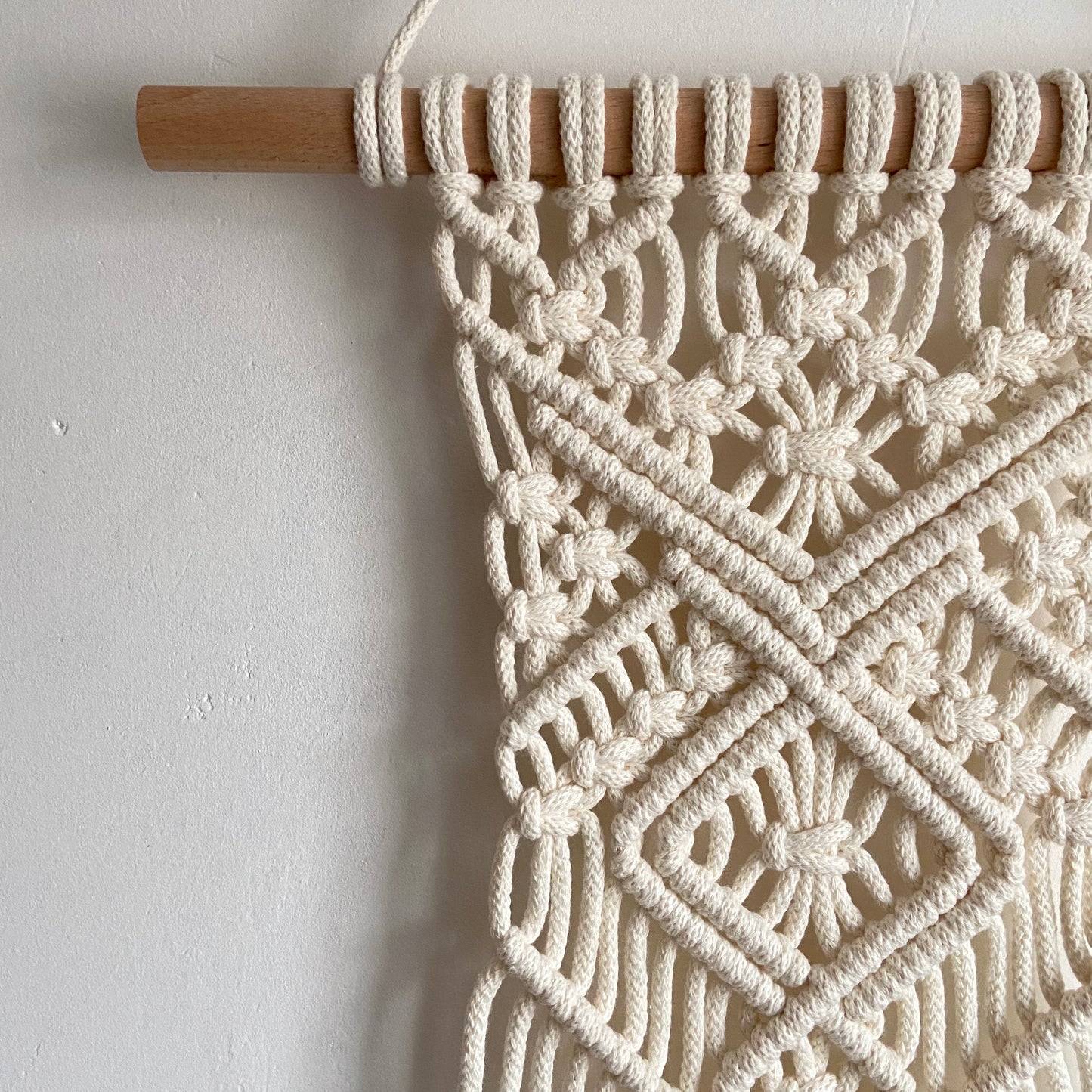 Lucia macramé wall hanging in ivory
