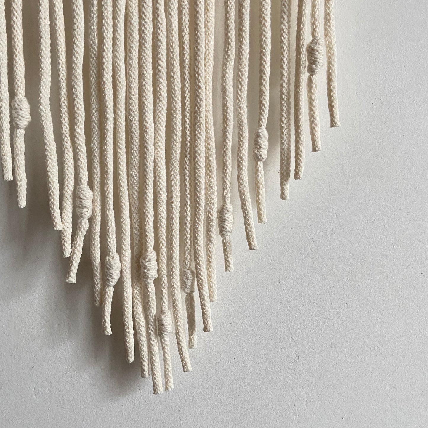 Lucia macramé wall hanging in ivory